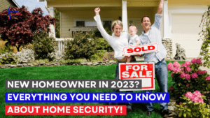 A couple of people holding up signs in front of a house: new homeowner