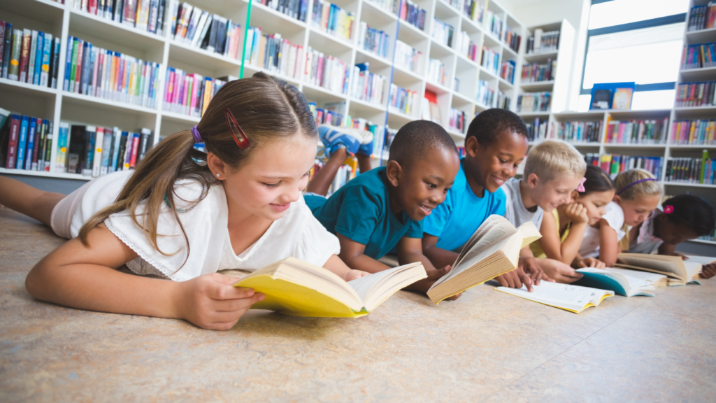 students reading in the school library