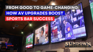 Set of newly installed large screen TVs in a sports bar called Sundown in Surfside BEach, South Carolina