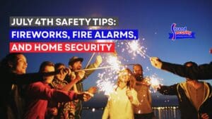 Adults at the beach with sparklers and fireworks, July 4th Safety Tips